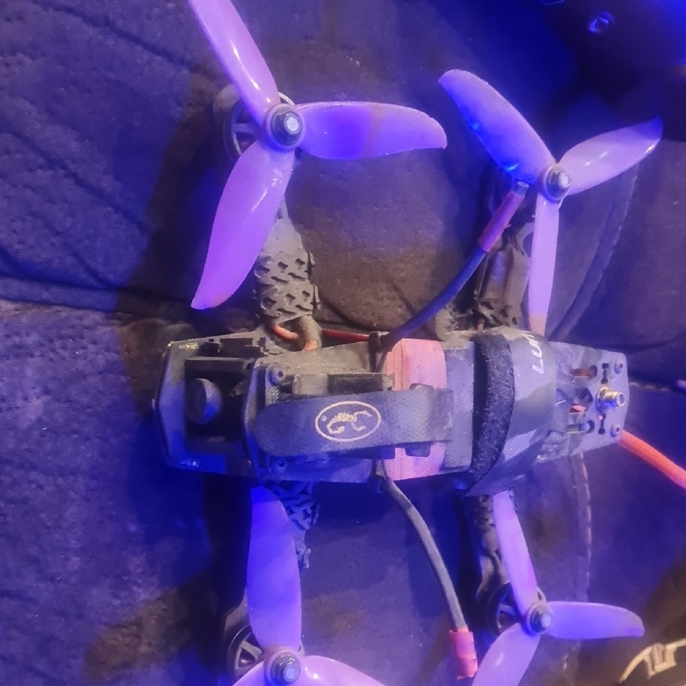 High-Performance Black and Purple Racing Drone